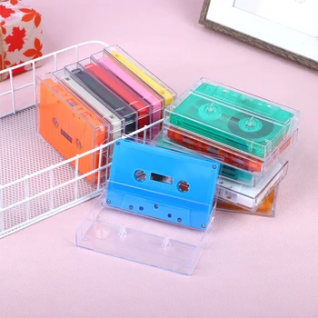1 комплект стандартных цветных кассет, пустой магнитофон с магнитной аудиокассетой на 45 минут, прозрачный ящик для хранения речи, записи музыки.